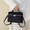 00057b26-a046-41c7-a157-ff5999104191-Max-Origin.jpg Textured Zipper Crossbody Bag