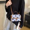 14b2bf5c-cb49-47e9-a465-e36236e731df-Max-Origin.jpg Polka Dot Crossbody Bag
