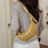 5723ebec-3ebc-4875-ae2d-f7d056591045-Max-Origin.jpg Crescent-Shaped Crossbody Bag