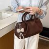 71f7d6ee-c685-4be0-9703-e984ec36f5a5-Max-Origin.jpg Top Handle Crossbody Bag