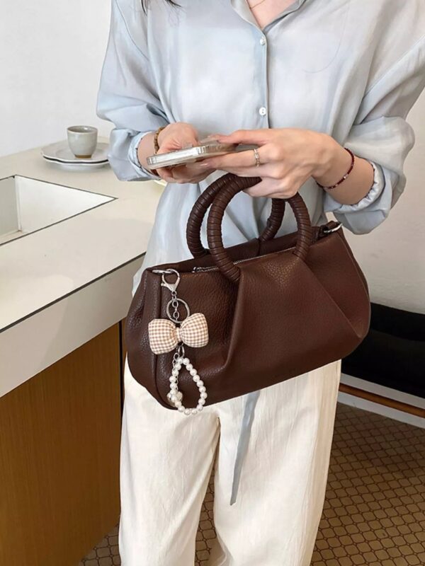 71f7d6ee-c685-4be0-9703-e984ec36f5a5-Max-Origin.jpg Top Handle Crossbody Bag