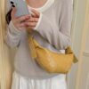 e15526a2-236d-4aa7-987a-7a990a6c99cf-Max-Origin.jpg Crescent-Shaped Crossbody Bag