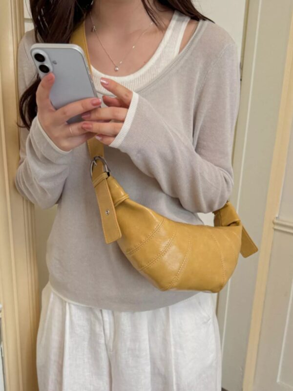 e15526a2-236d-4aa7-987a-7a990a6c99cf-Max-Origin.jpg Crescent-Shaped Crossbody Bag