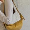 ec47a3bc-969e-4d67-a94f-73ccf66c7ca6-Max-Origin.jpg Crescent-Shaped Crossbody Bag