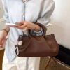 ee71d3a9-d131-4b2e-a7f9-a864879cf536-Max-Origin.jpg Top Handle Crossbody Bag