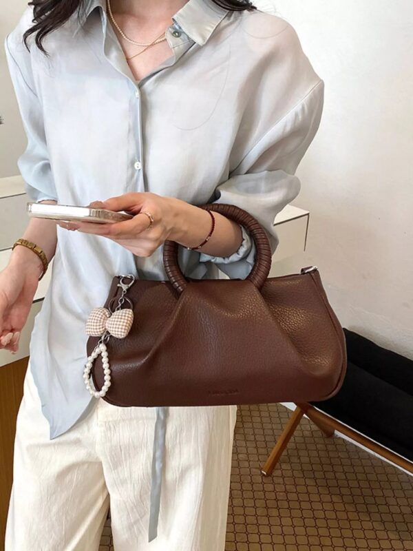 ee71d3a9-d131-4b2e-a7f9-a864879cf536-Max-Origin.jpg Top Handle Crossbody Bag